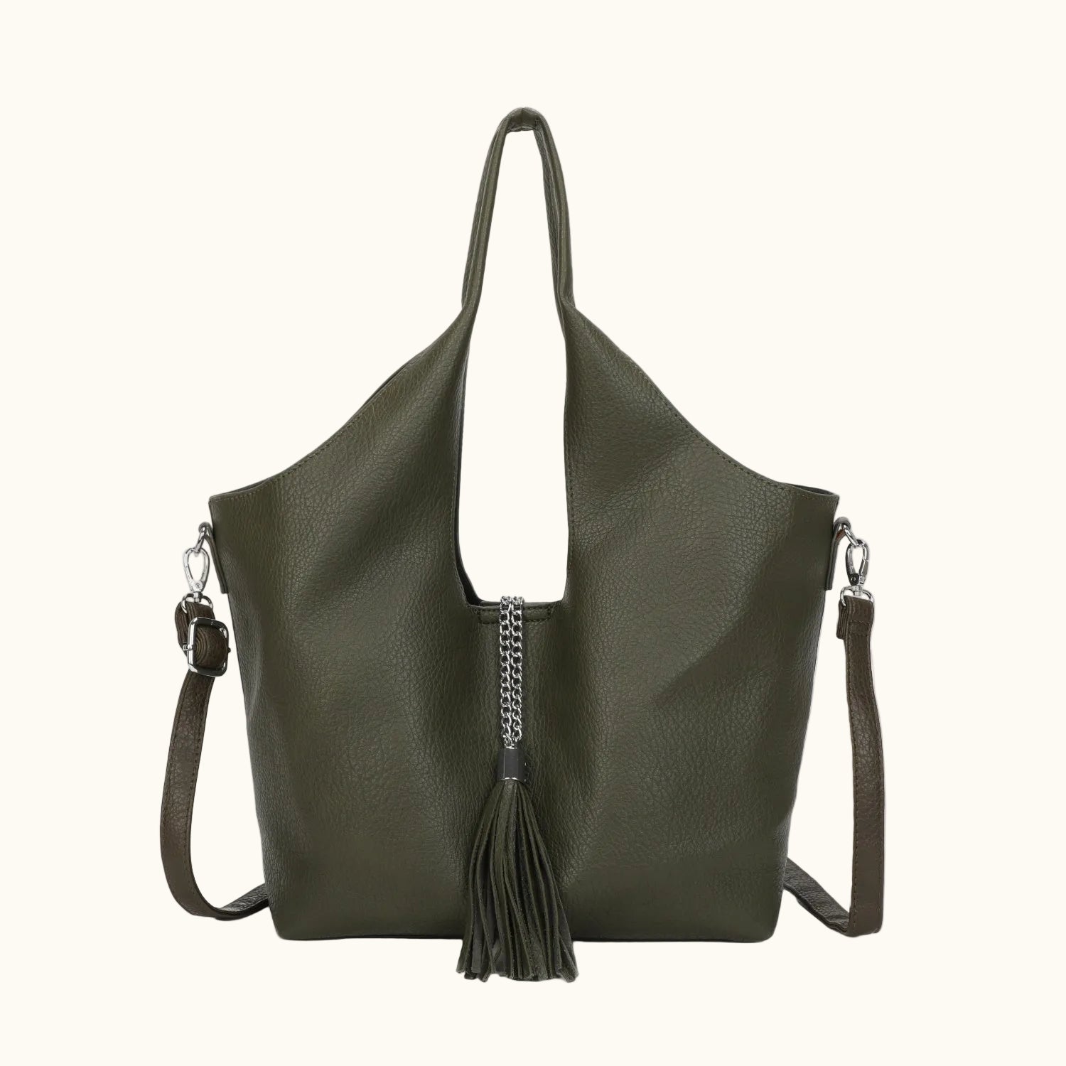 Green handbag with a tassel on a white background