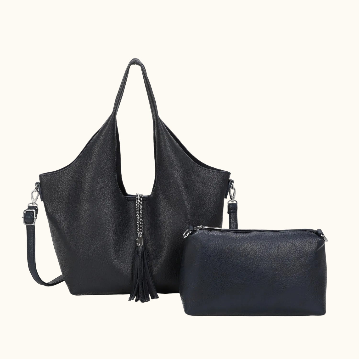 Black leather handbag with matching pouch on a white background