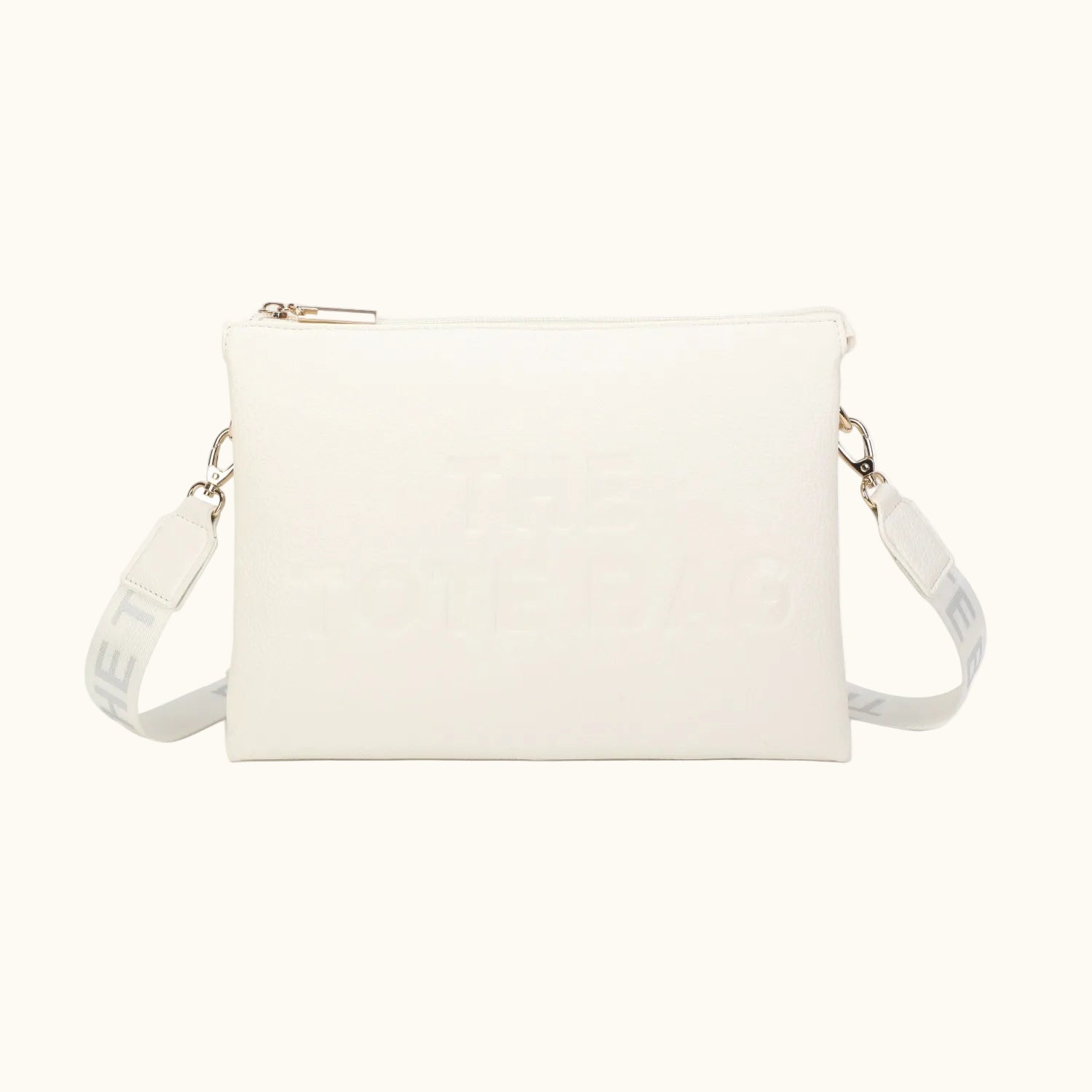 White handbag with a strap on a white background