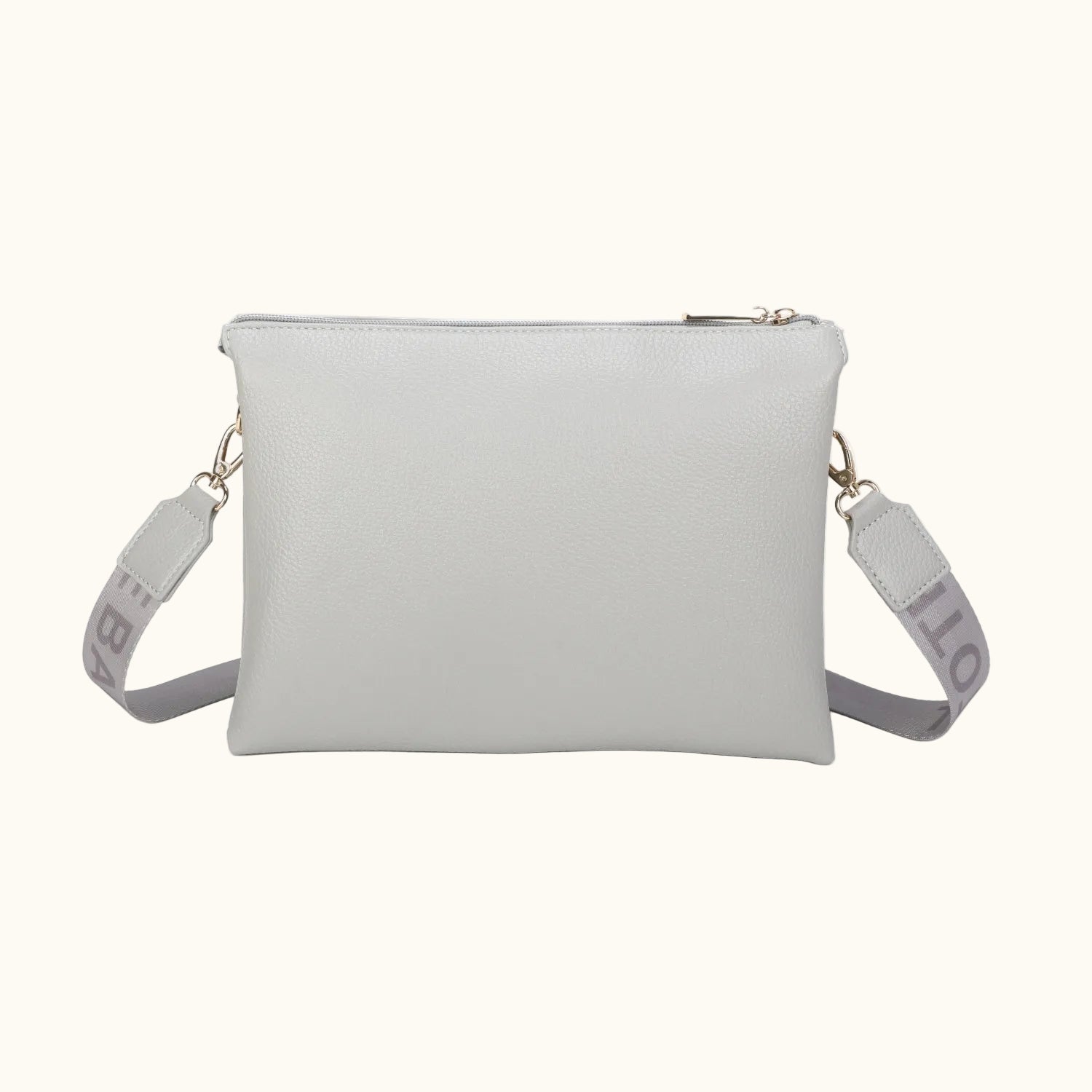 Light gray crossbody bag with a strap on a white background