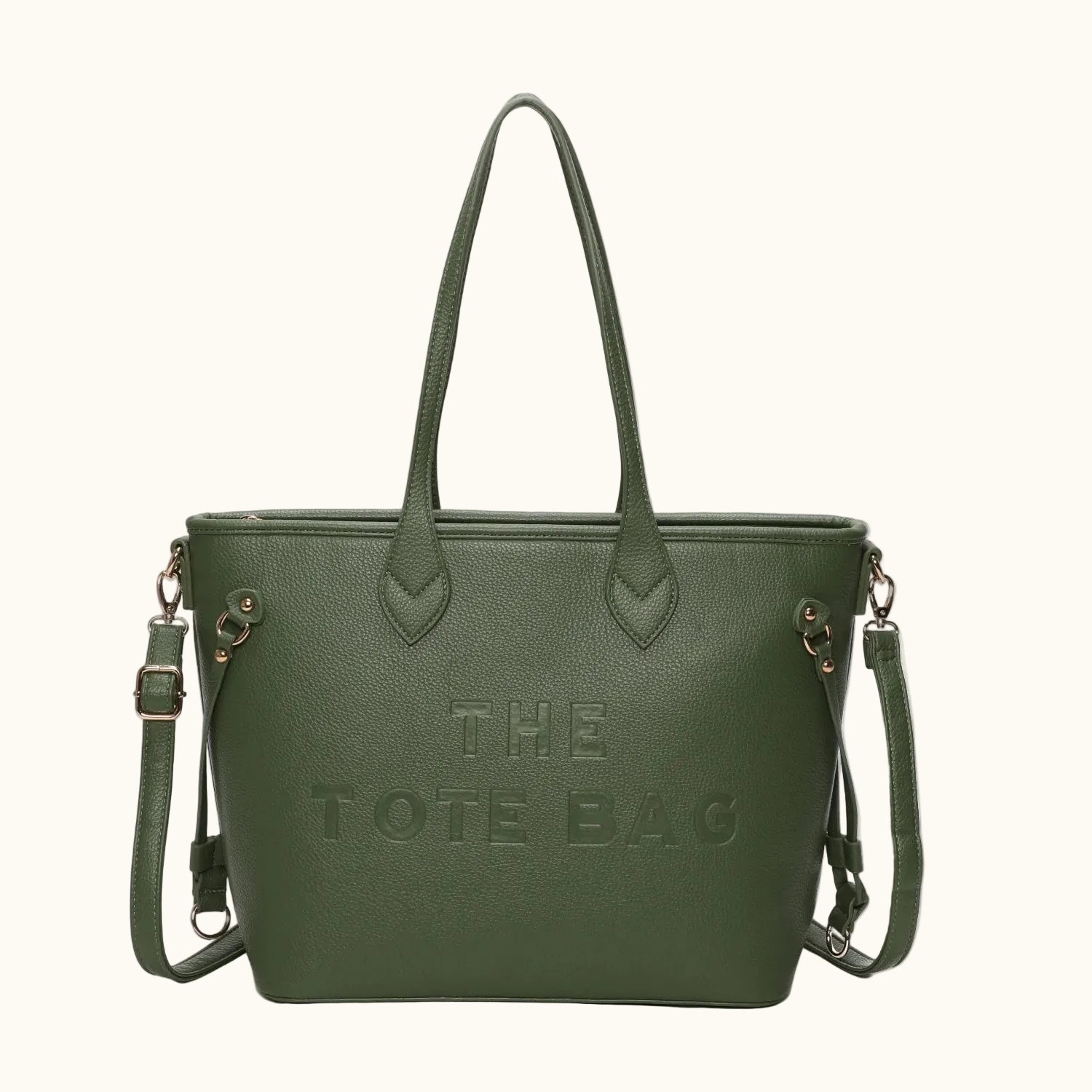 Green tote bag with 'THE TOTE BAG' text on a white background