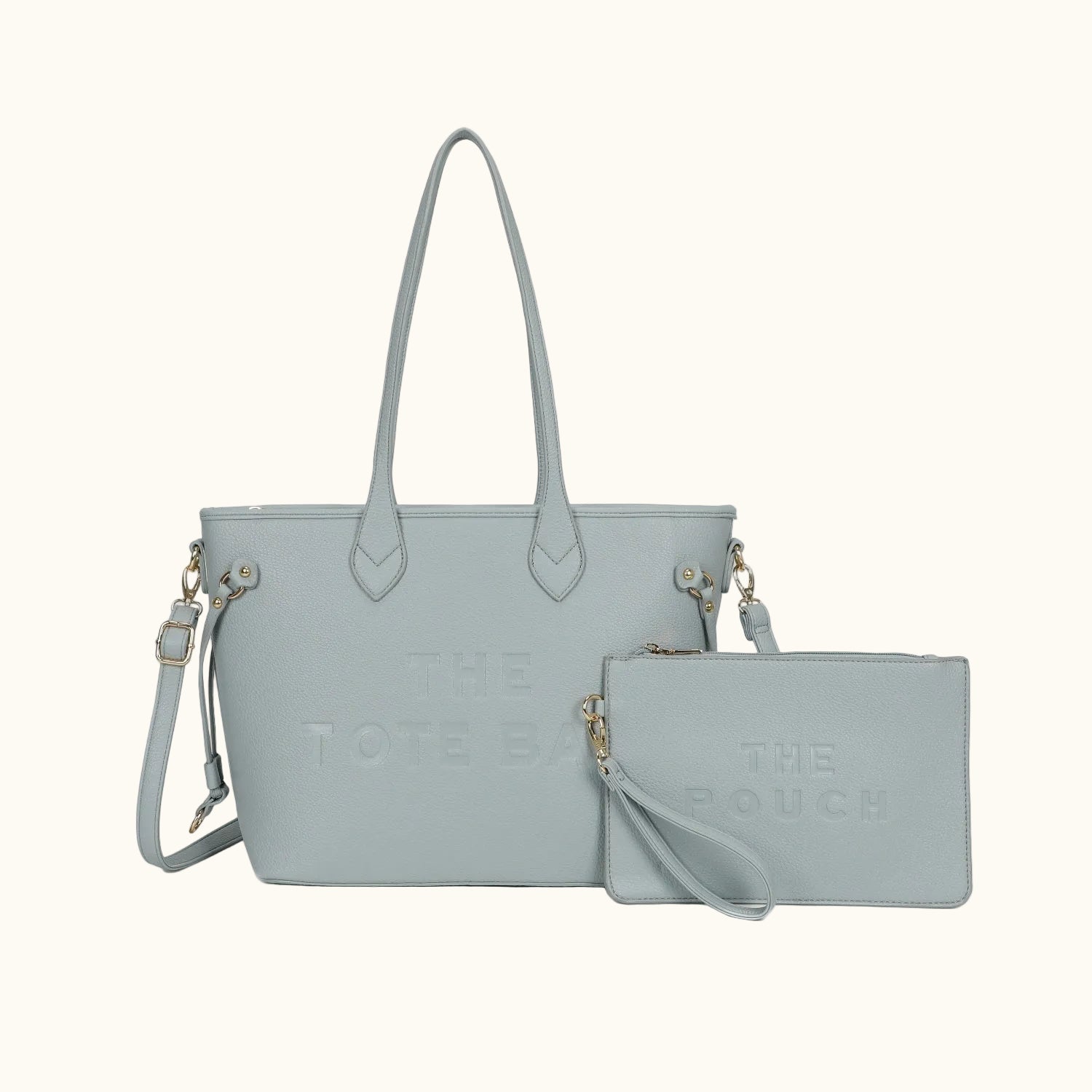 Light blue handbag with matching pouch on a white background