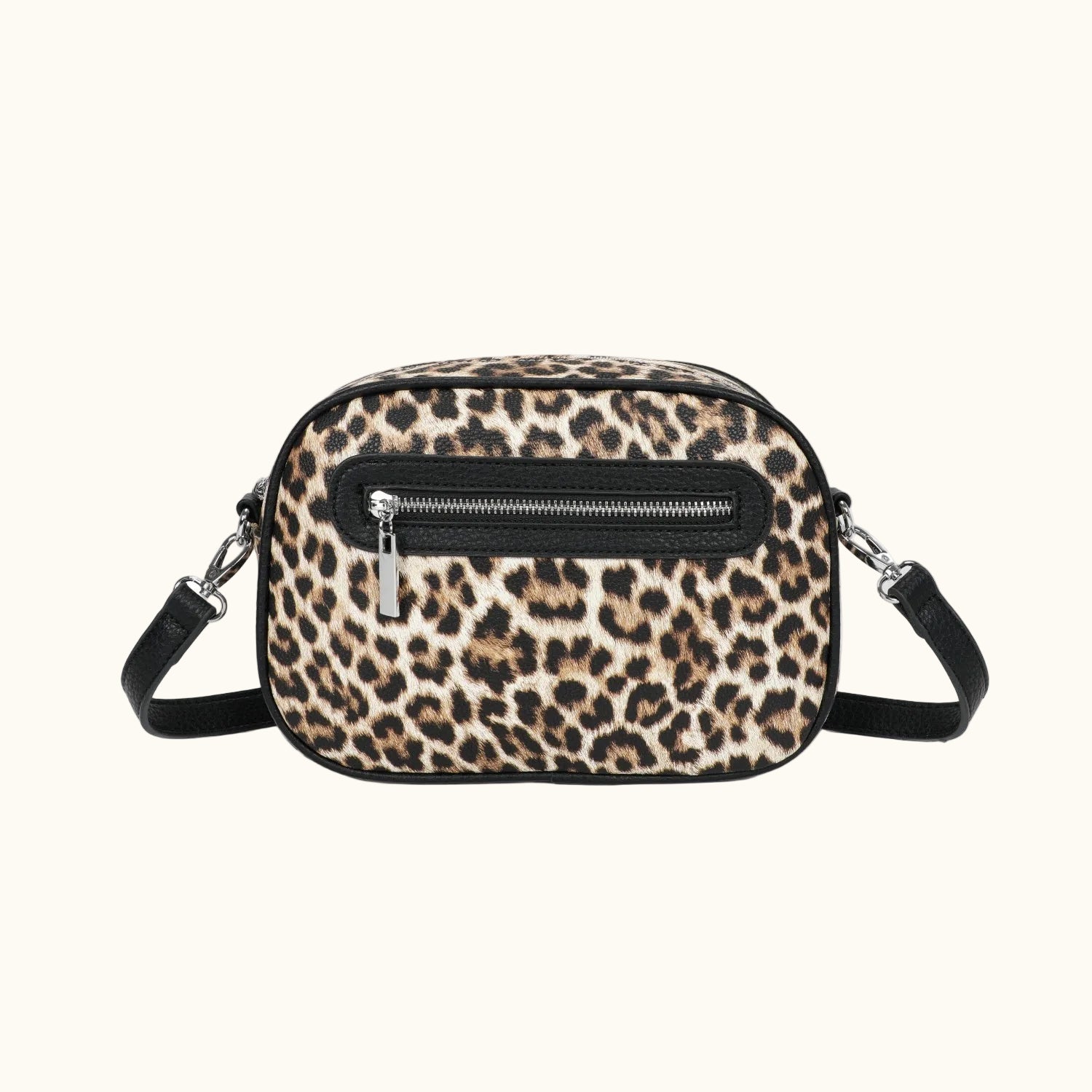 Leopard print crossbody bag with black accents on a white background