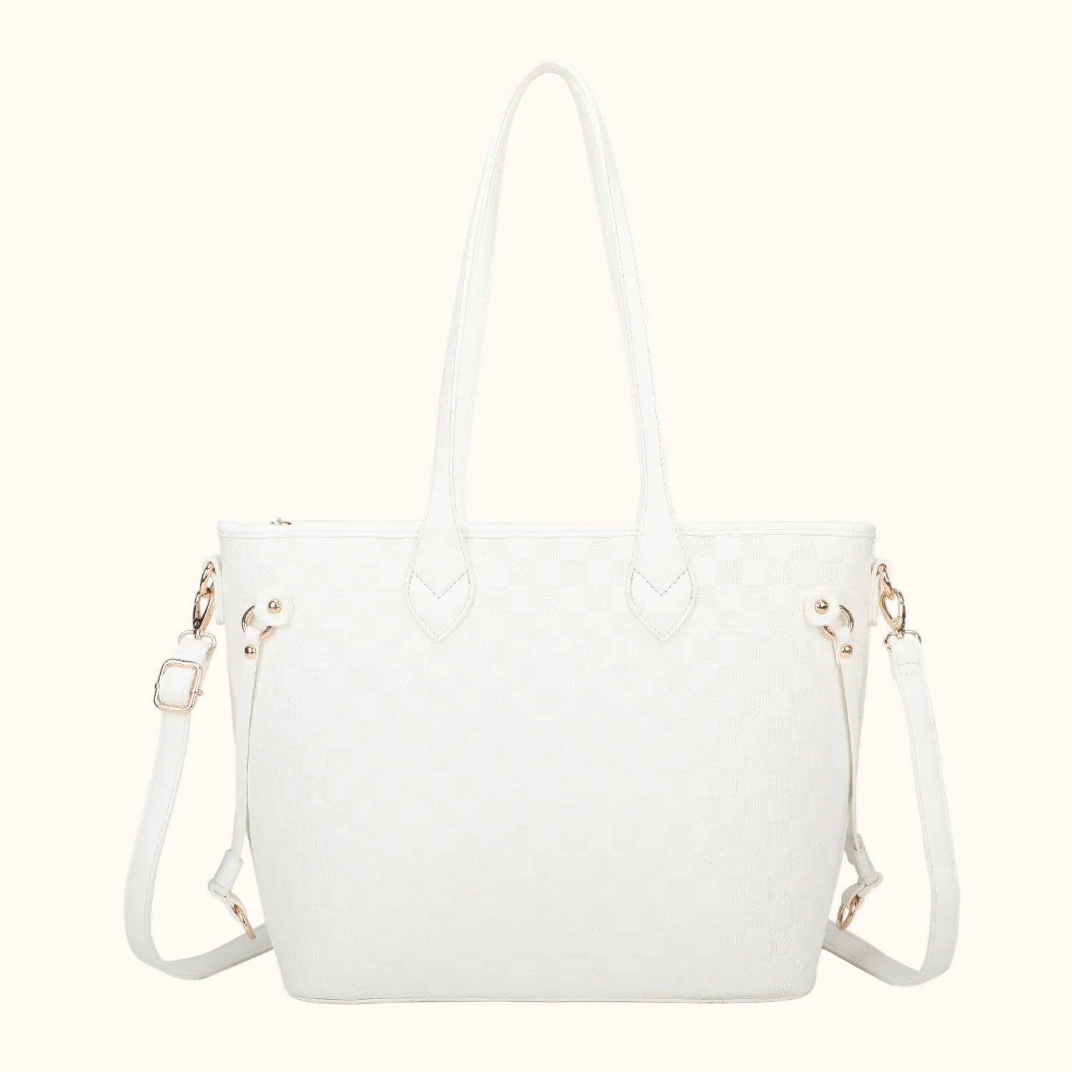White handbag with gold accents on a white background