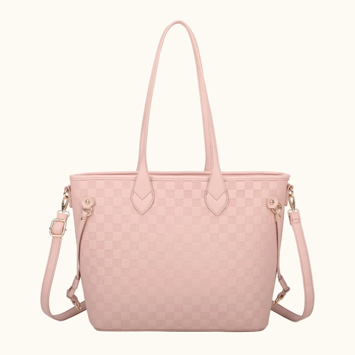 Pink woven handbag with a shoulder strap on a white background