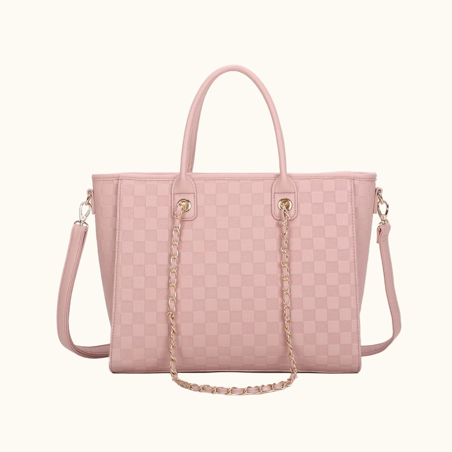 Pink woven handbag with a chain detail on a white background