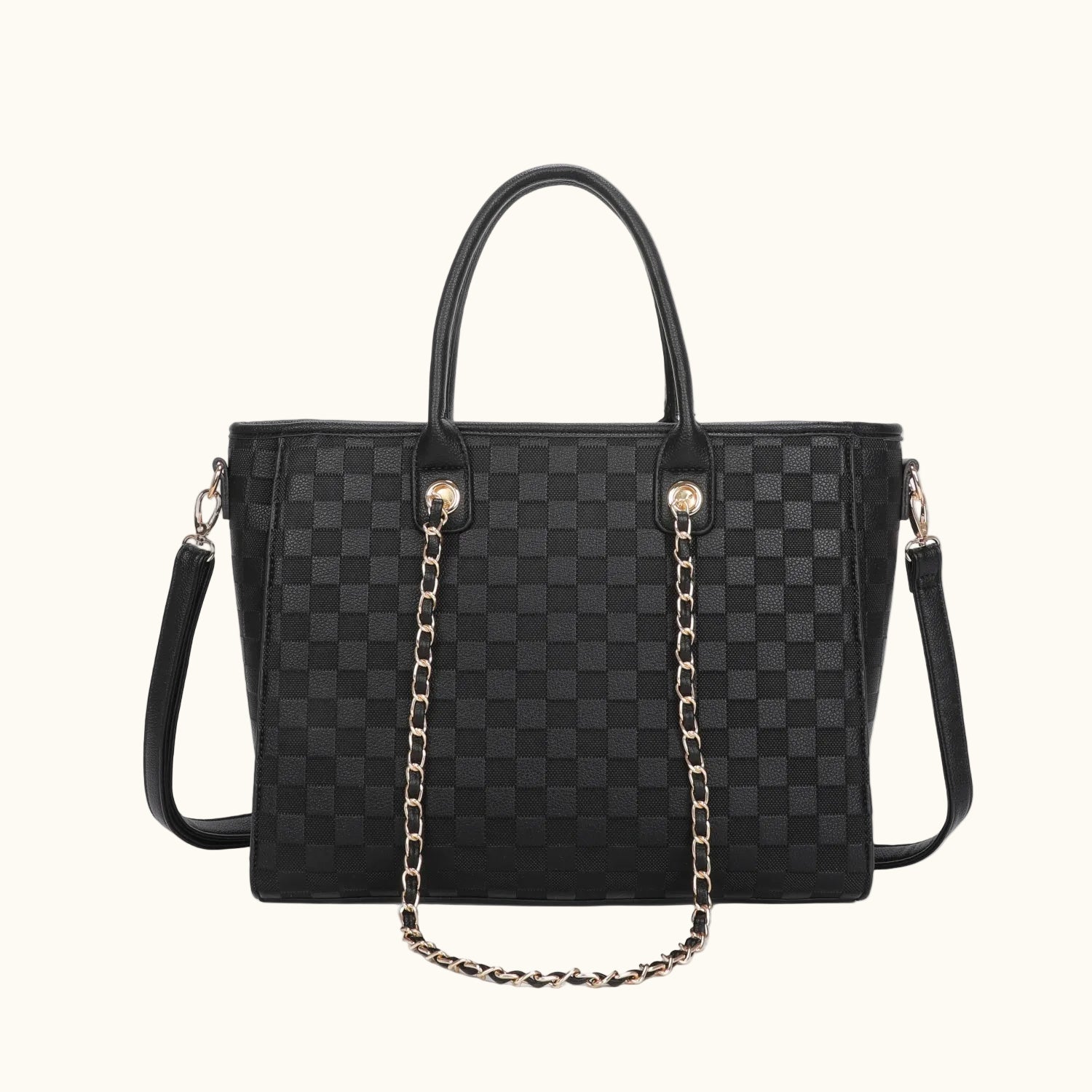 Black checkered handbag with gold chain detail on a white background
