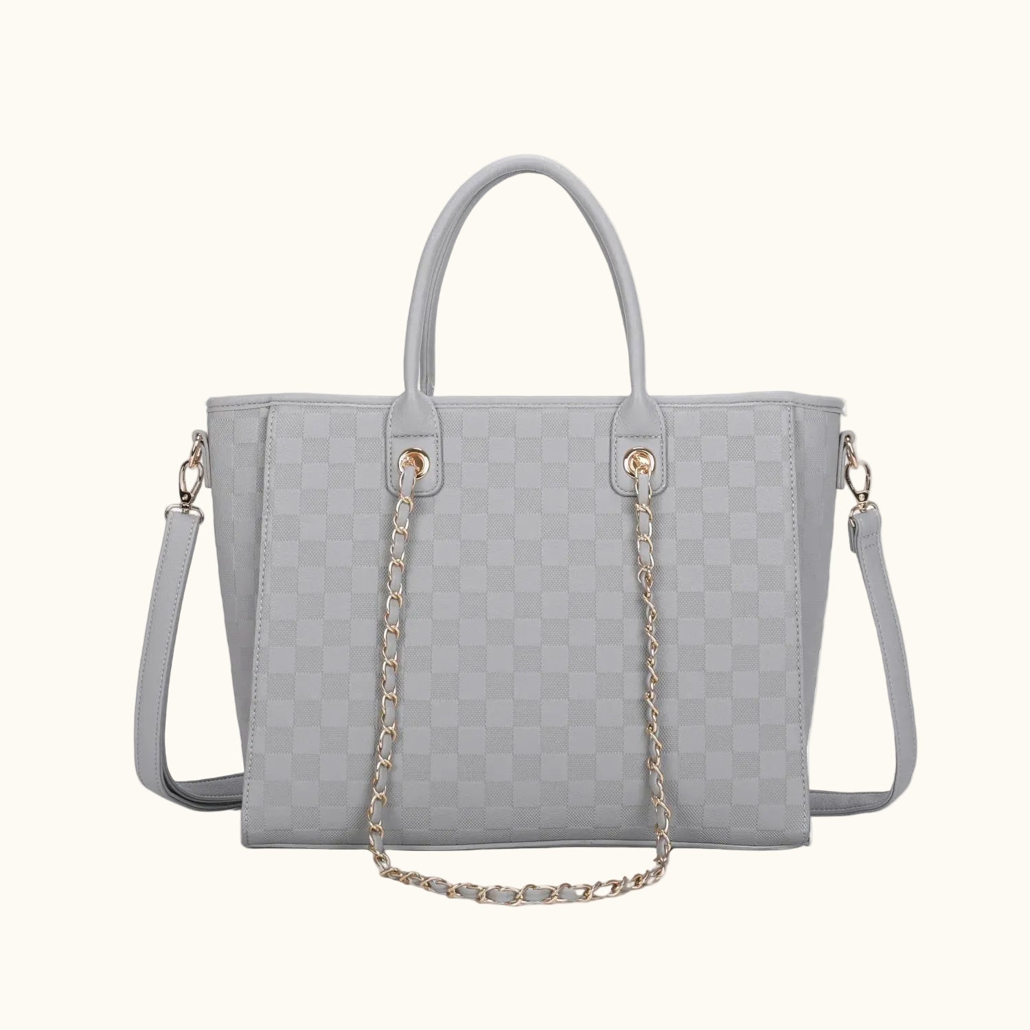 Gray quilted handbag with a chain detail on a white background
