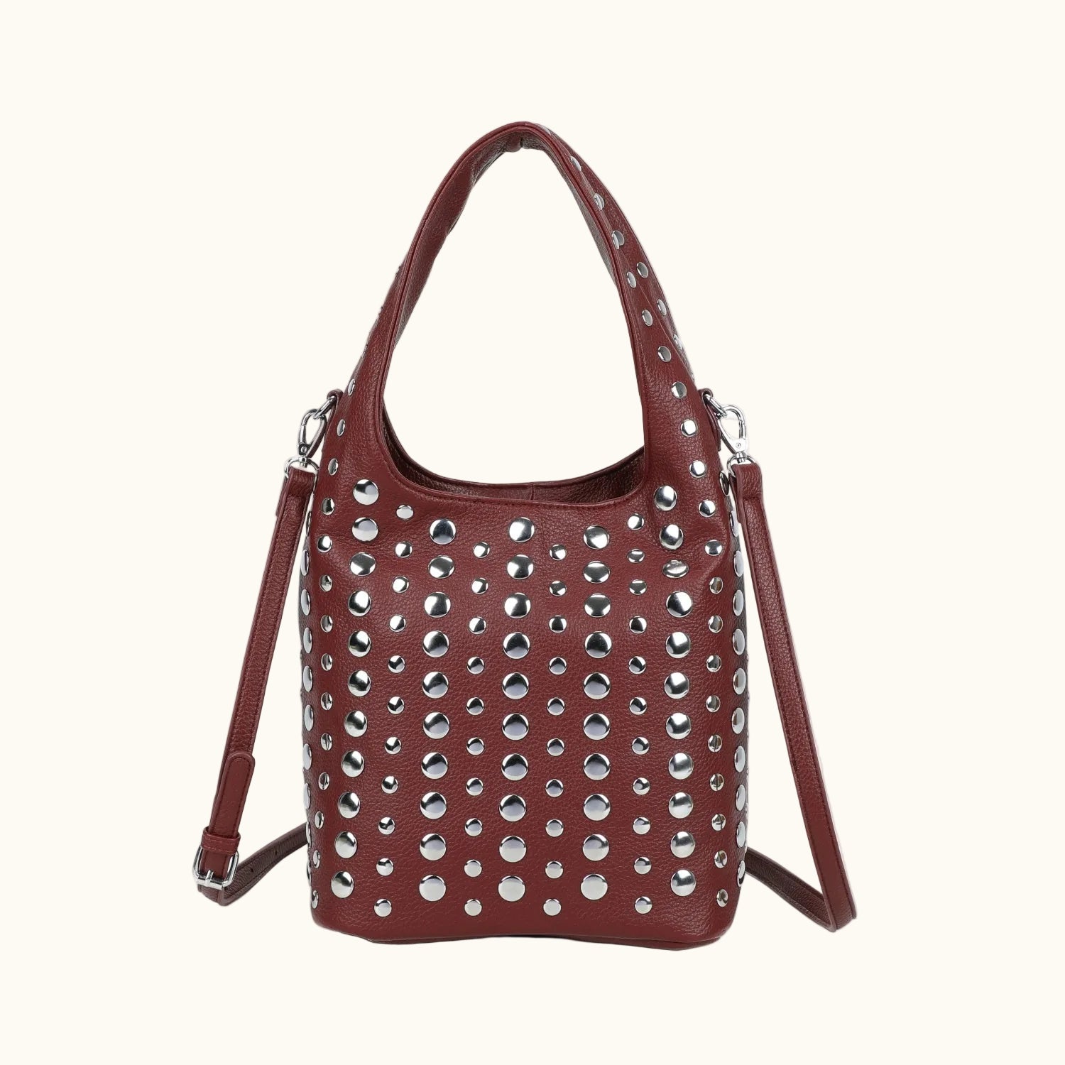 Brown handbag with silver studs on a white background