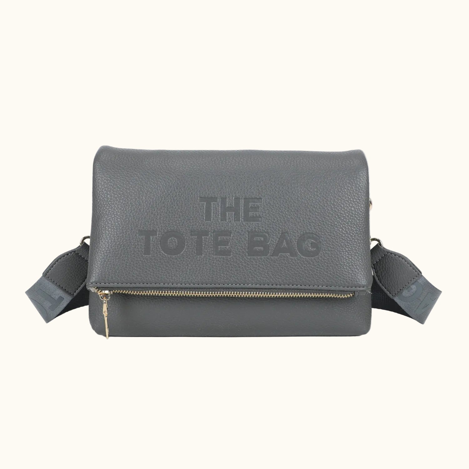 Gray tote bag with 'THE TOTE BAG' text on a white background