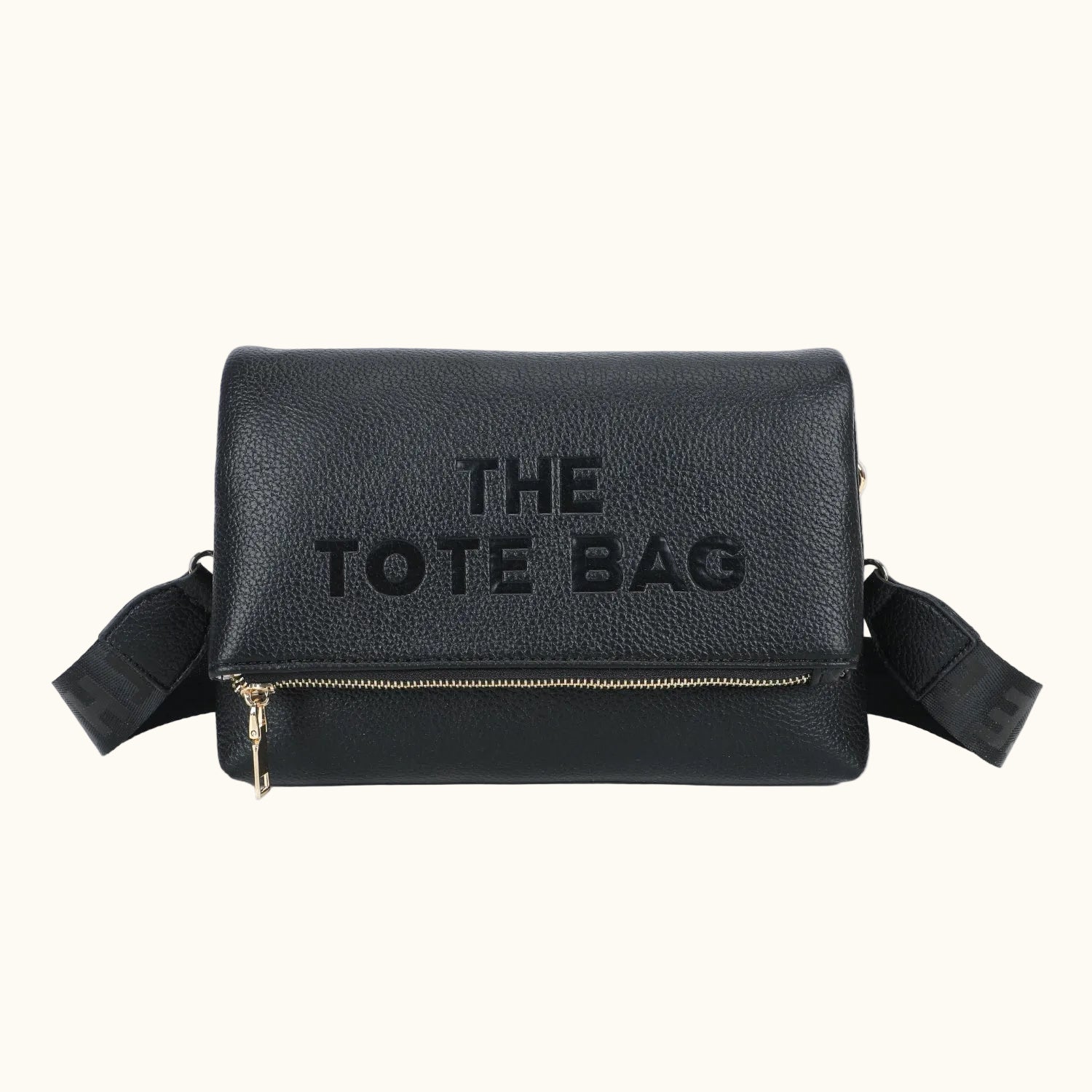 Black tote bag with 'THE TOTE BAG' text on a white background
