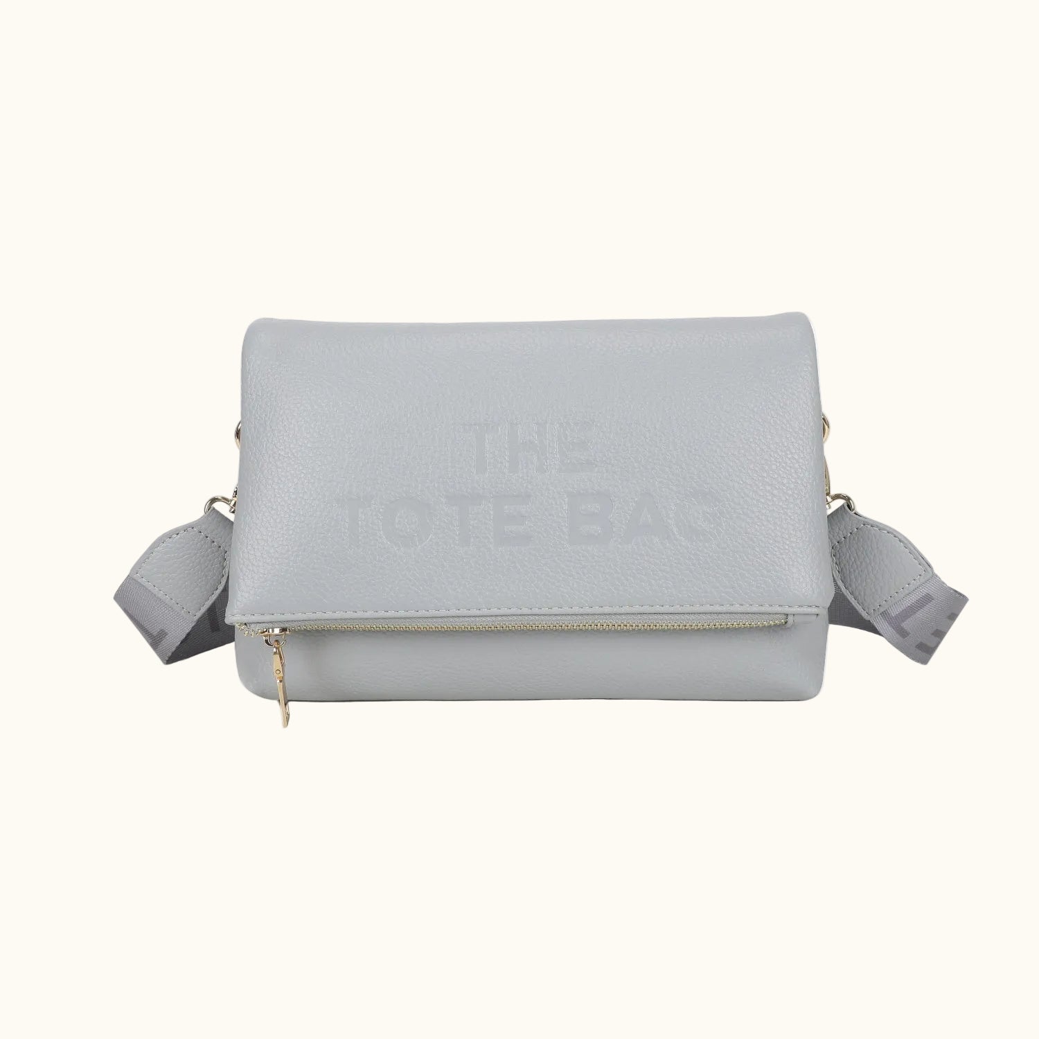 Gray crossbody bag with 'Celine' branding on a white background