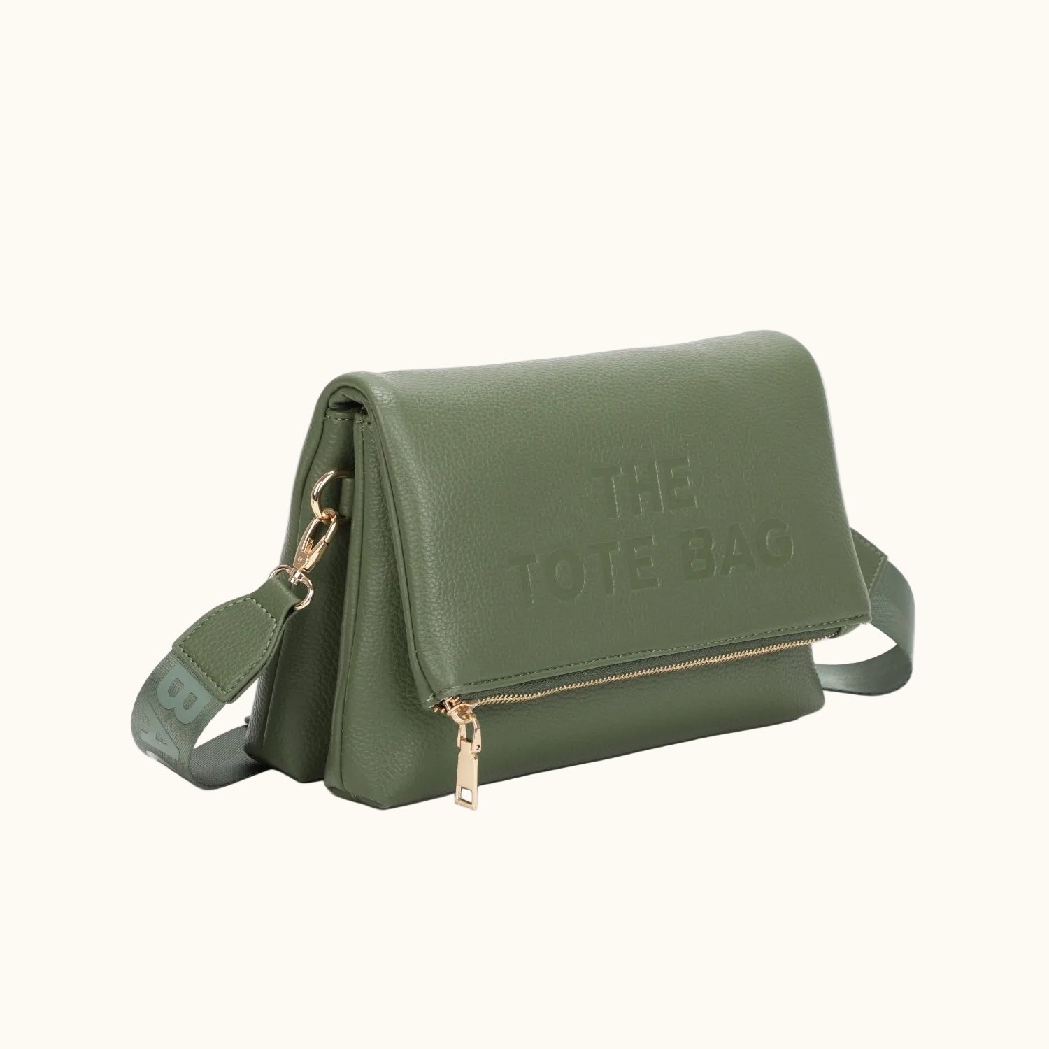 Green tote bag with 'THE TOTE BAG' text on a white background