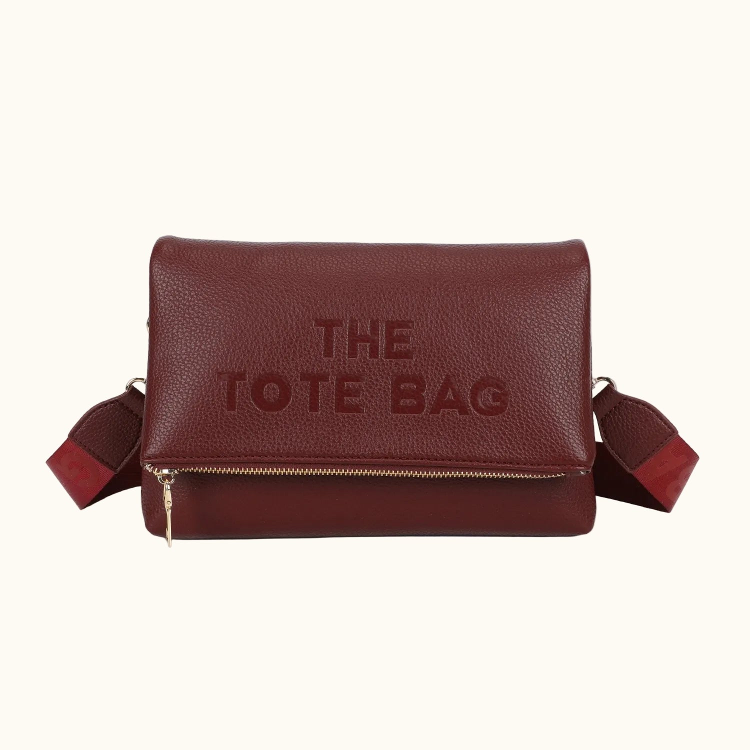 Brown tote bag with 'THE TOTE BAG' text on a white background
