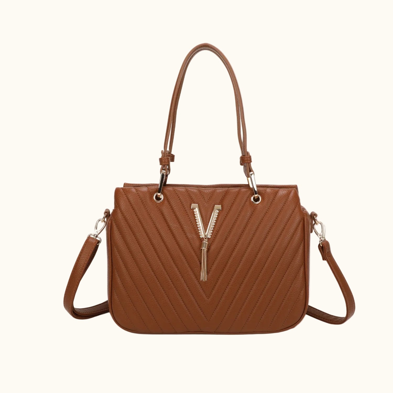 Brown handbag with a decorative 'Y' zipper on a white background
