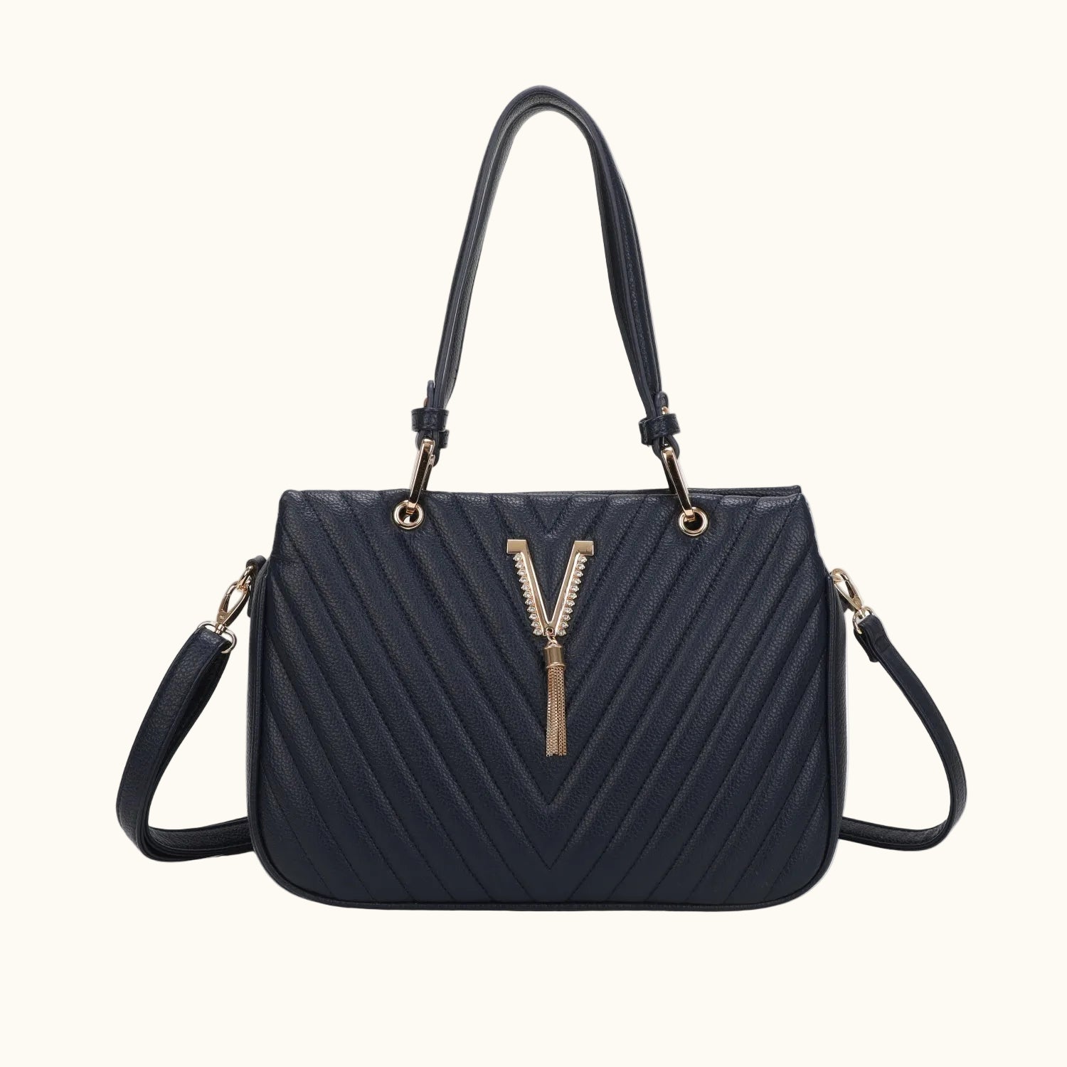 Black handbag with gold accents on a white background