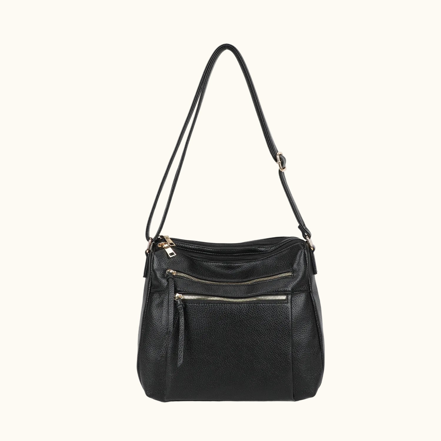 Black leather handbag with a shoulder strap on a white background