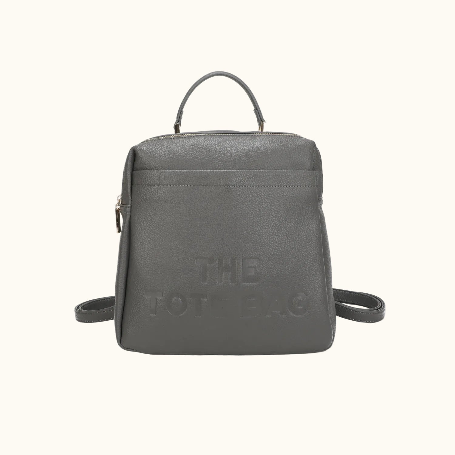 Gray backpack with 'THE TOT BAG' text on a white background