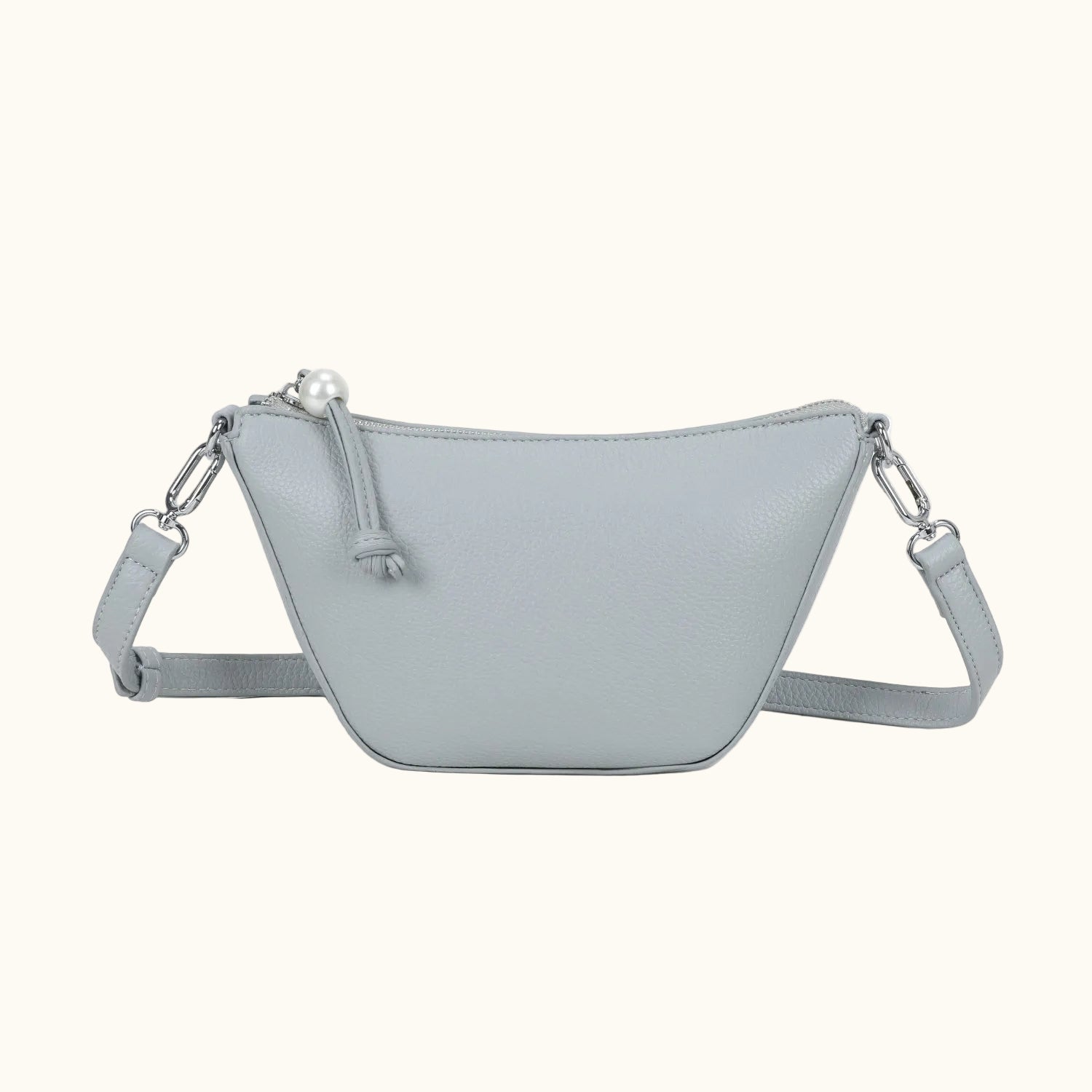 Light gray crossbody bag with chain detail on a white background