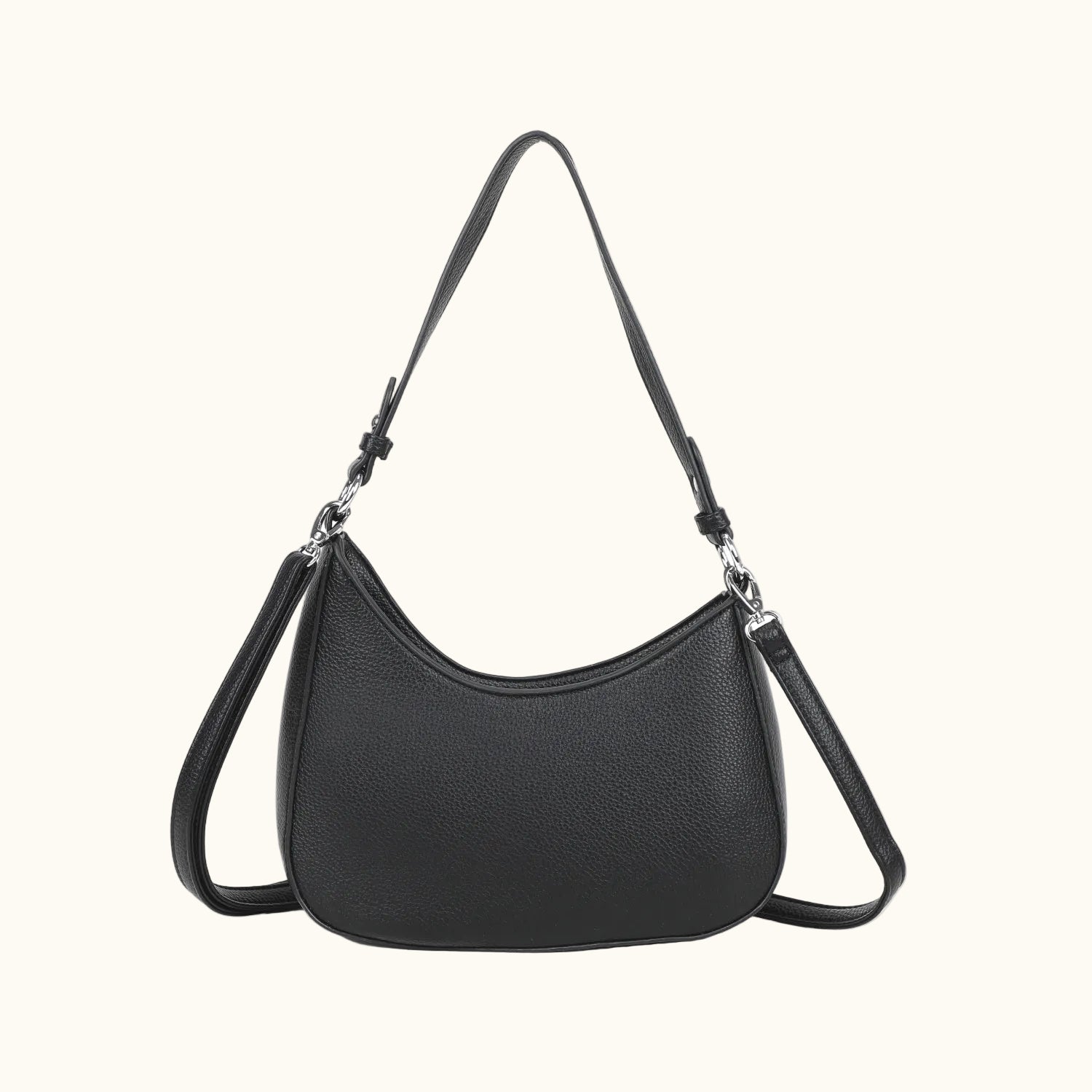 Black handbag with a shoulder strap on a white background