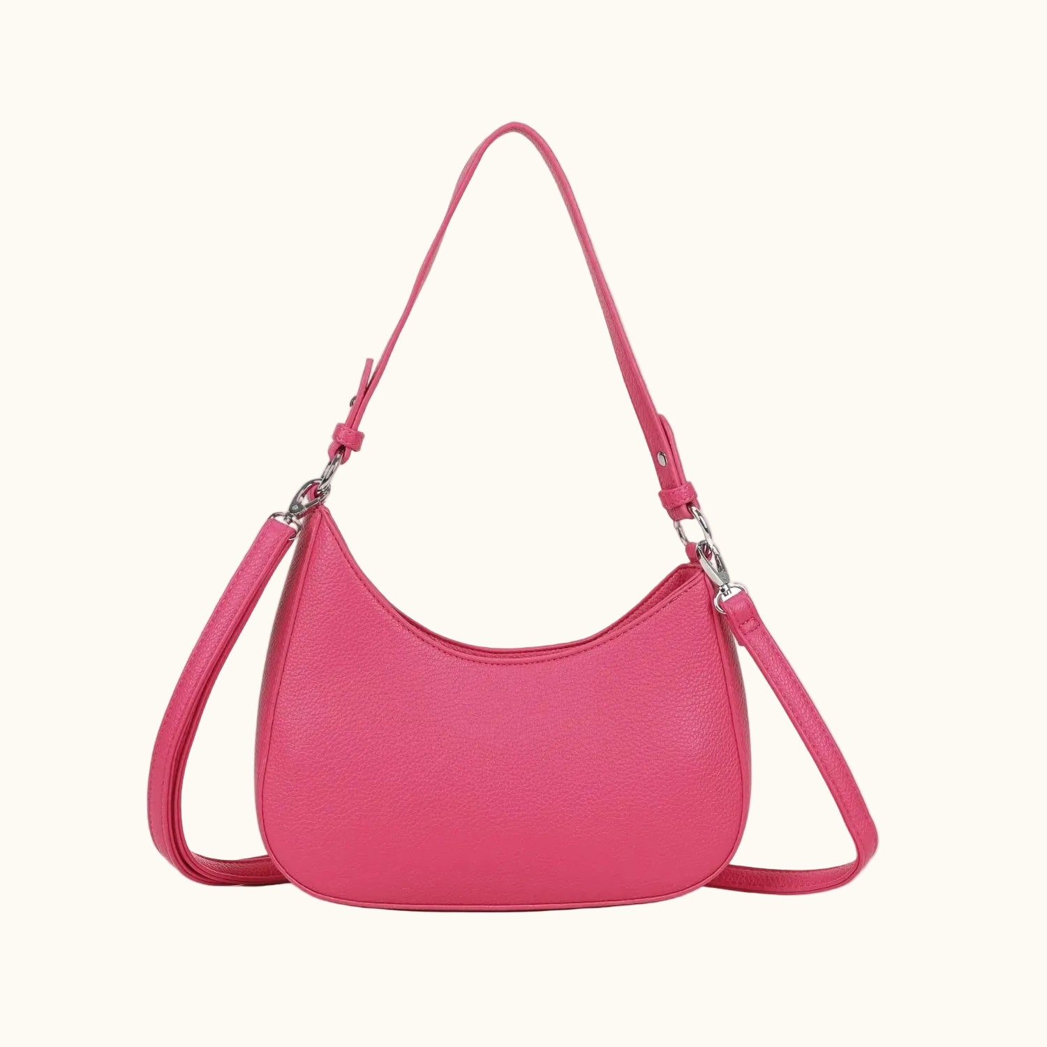 Pink handbag with a strap on a white background