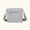 Light gray crossbody bag with a strap on a white background