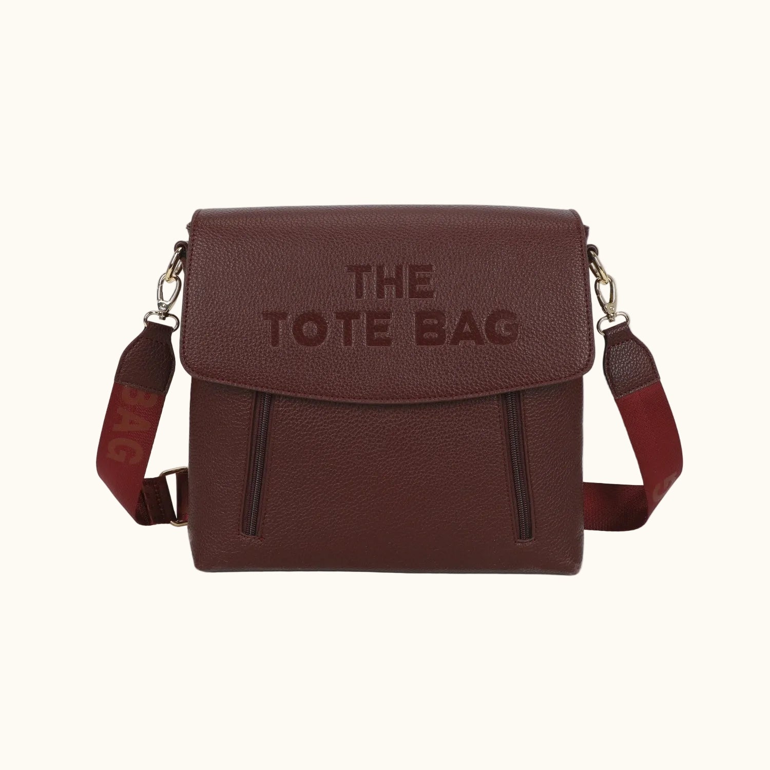 Brown tote bag with 'THE TOTE BAG' text on a white background