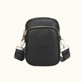 Black crossbody bag with gold accents on a white background