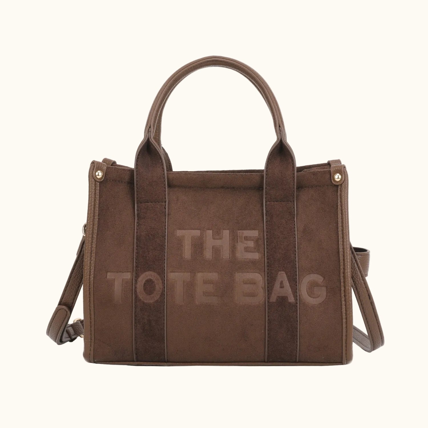 Brown tote bag with 'THE TOTE BAG' text on a white background