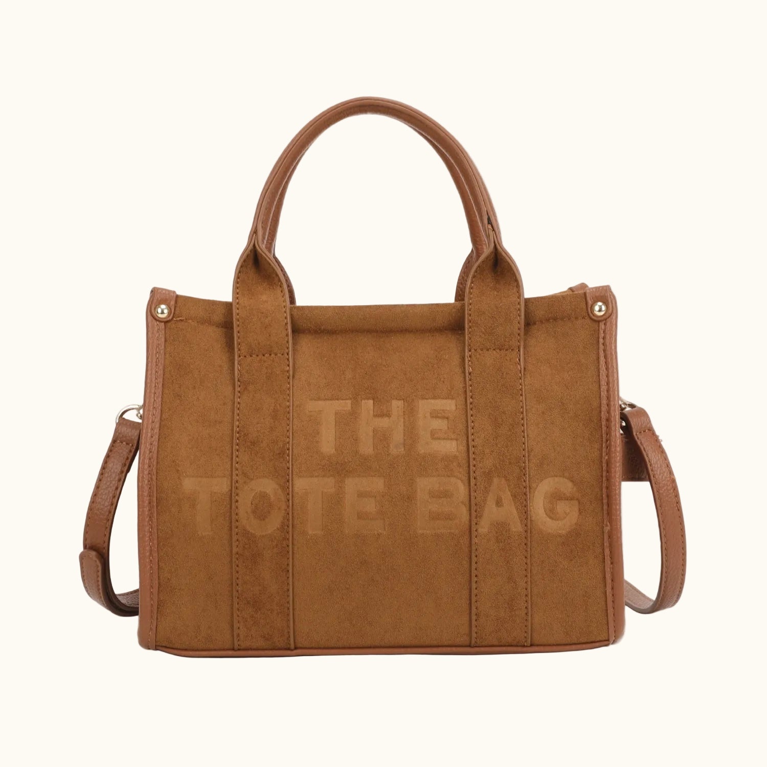 Brown tote bag with 'THE TOTE BAG' text on a white background