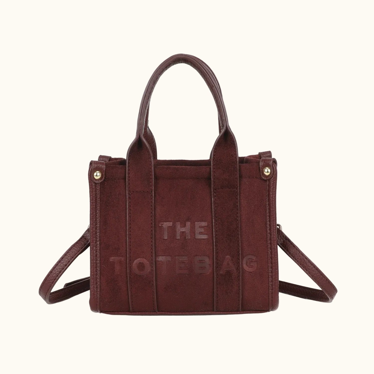 Brown tote bag with 'THE TOTE BAG' text on a white background