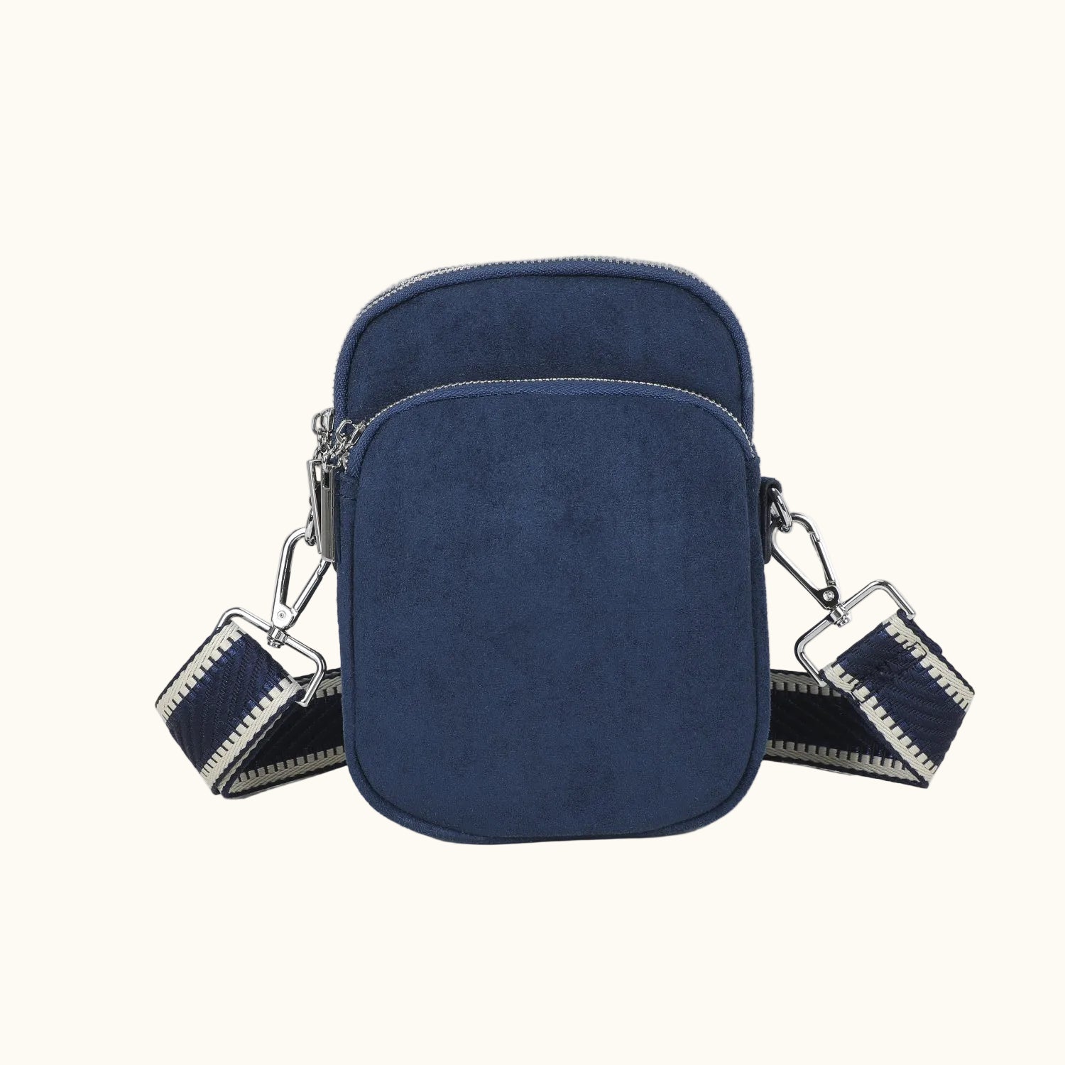 Navy blue crossbody bag with a strap on a white background