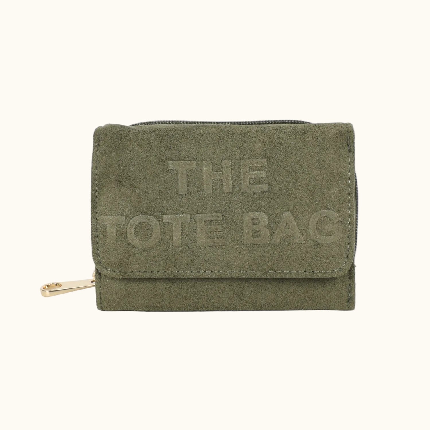 Green tote bag with 'THE TOTE BAG' text on a white background