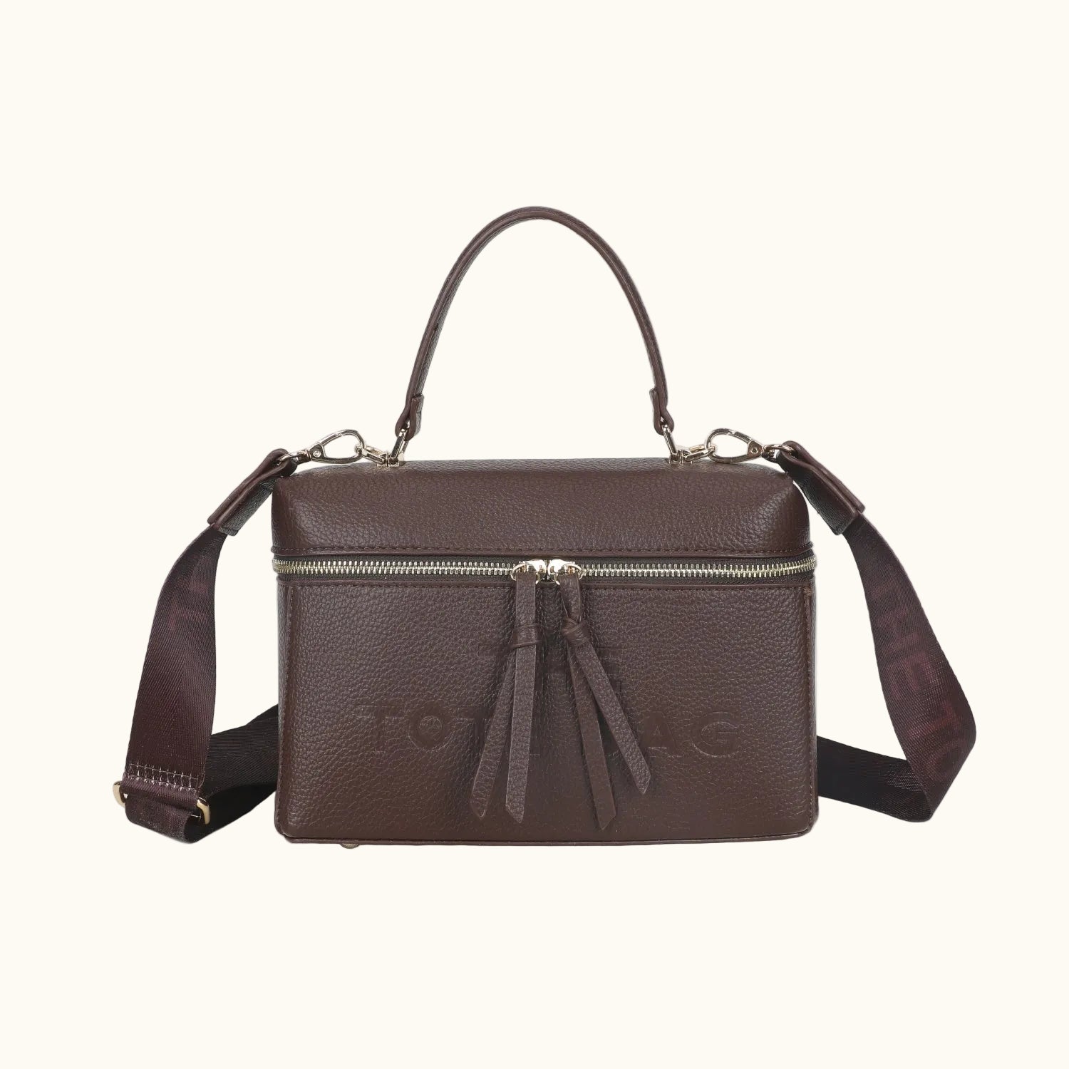 Brown leather handbag with a strap on a white background