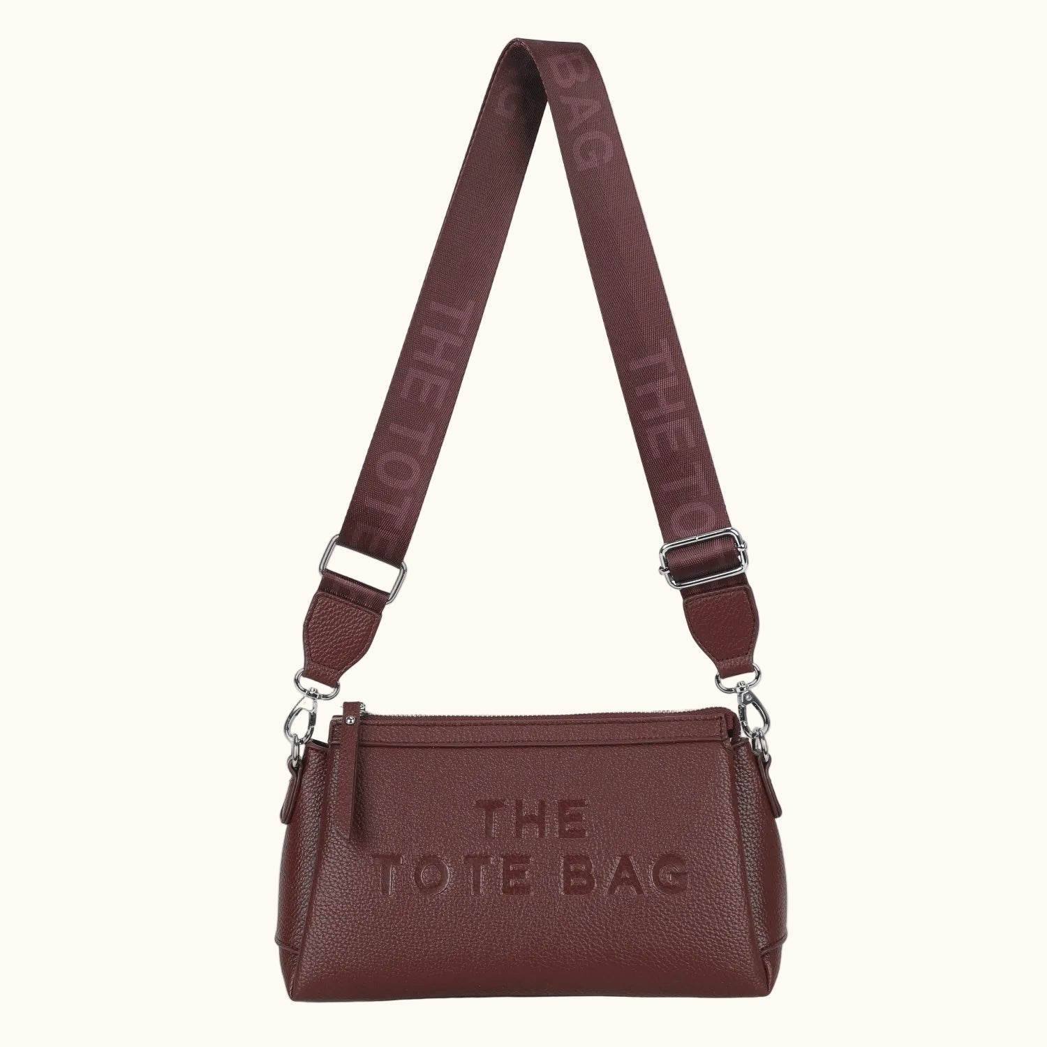 Brown tote bag with 'The Tote Bag' text on a white background