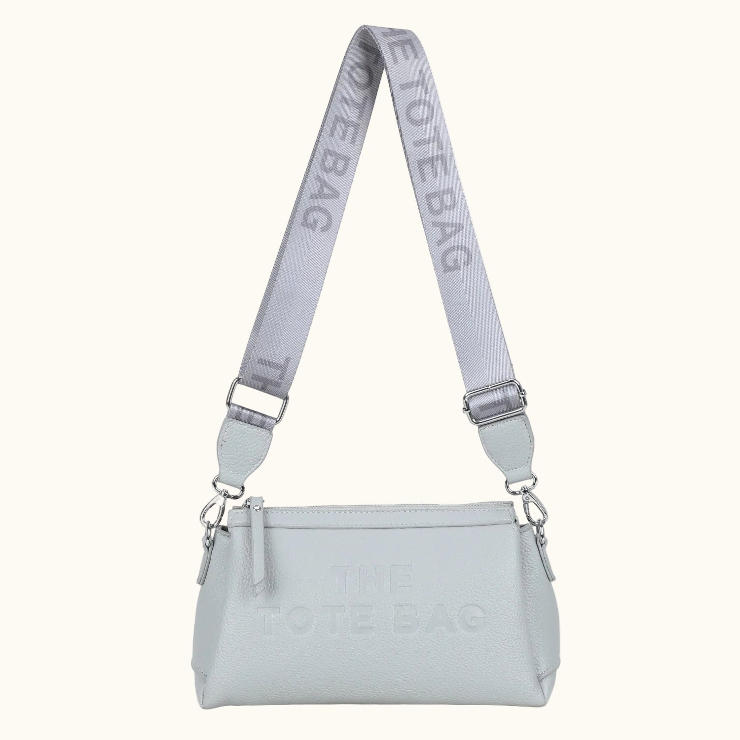 Light gray tote bag with matching strap on a white background