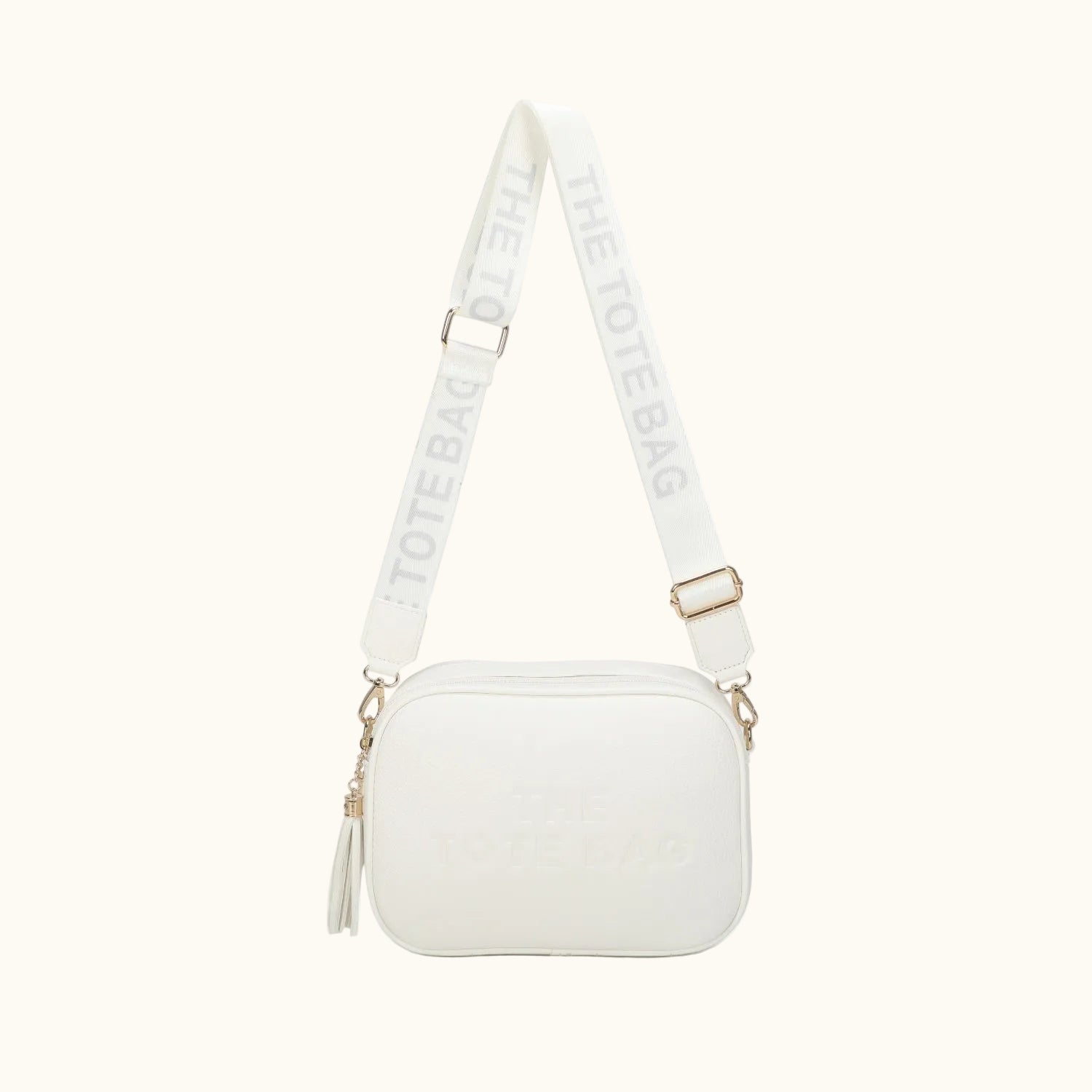 White crossbody bag with a visible brand name on the strap against a white background