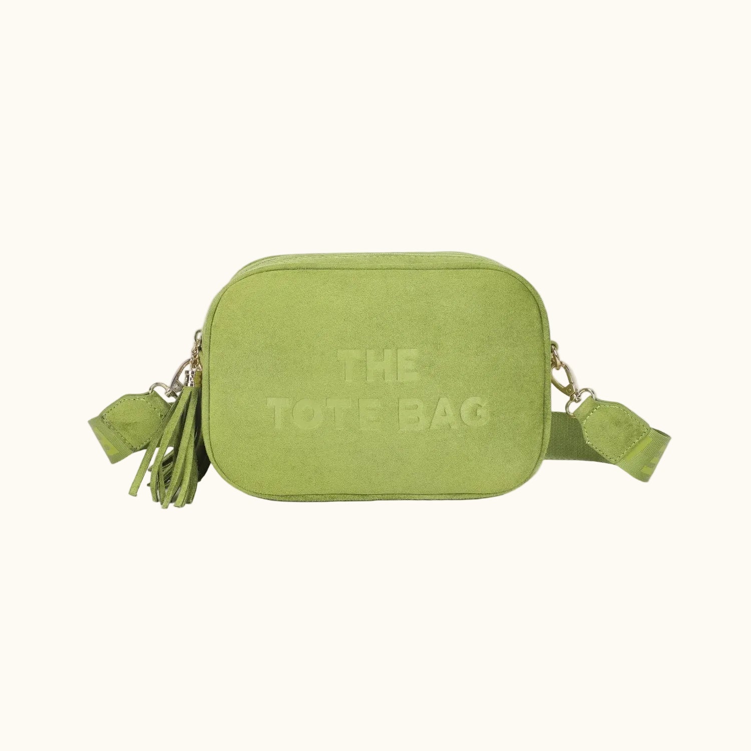 Green tote bag with 'THE TOTE BAG' text on a white background