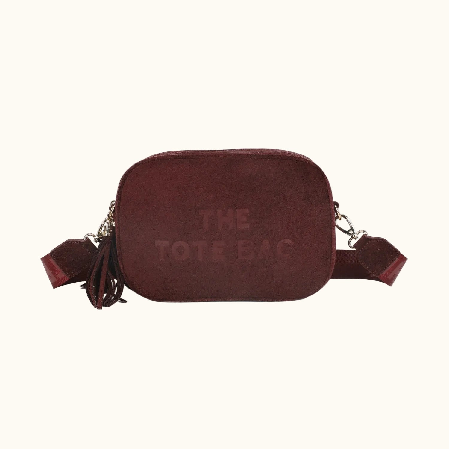 Brown suede tote bag with 'THE TOTE BAG' text on a white background
