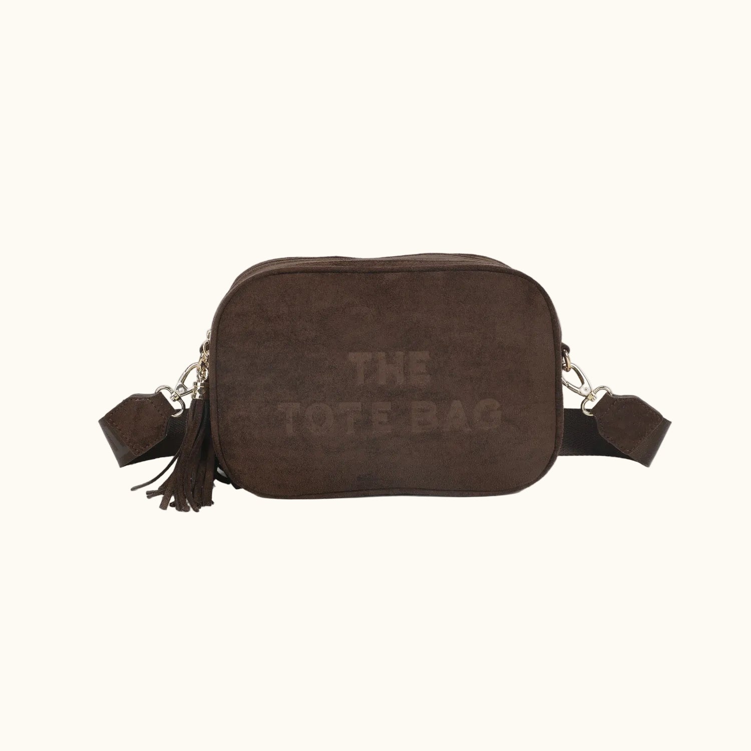 Brown suede tote bag with 'THE TOTE BAG' text on a white background