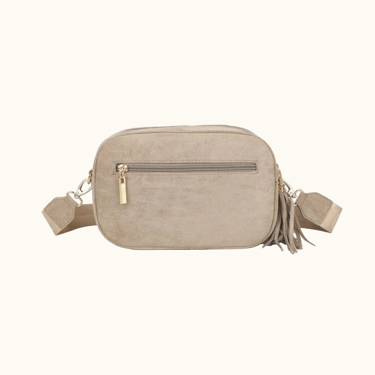 Beige crossbody bag with tassels on a white background