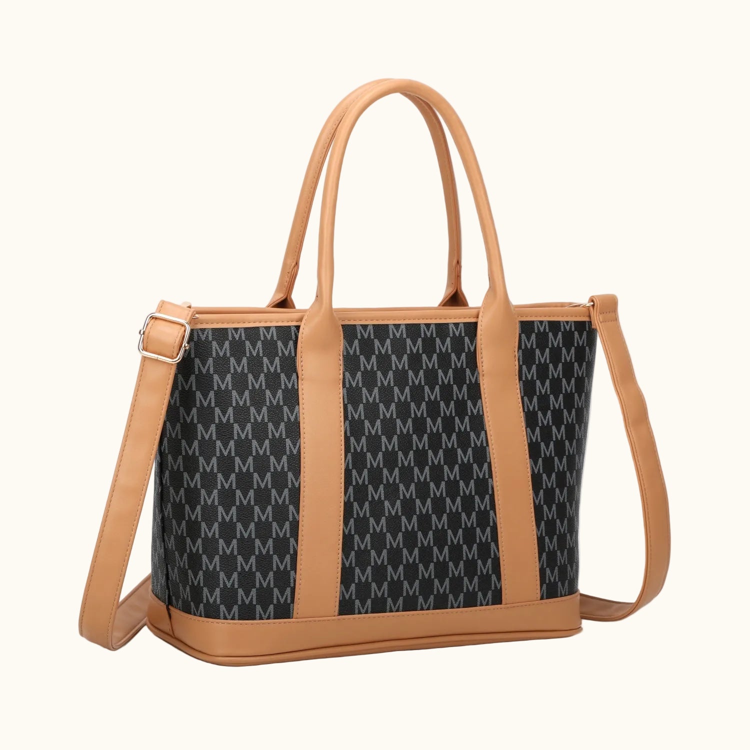 Tote bag with brown handles and trim, featuring a patterned black section on a white background.