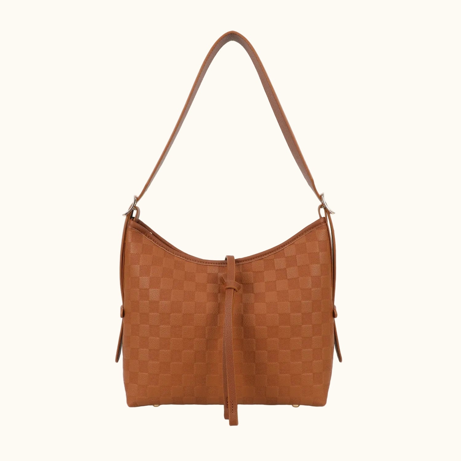 Brown checkered handbag with a strap on a white background