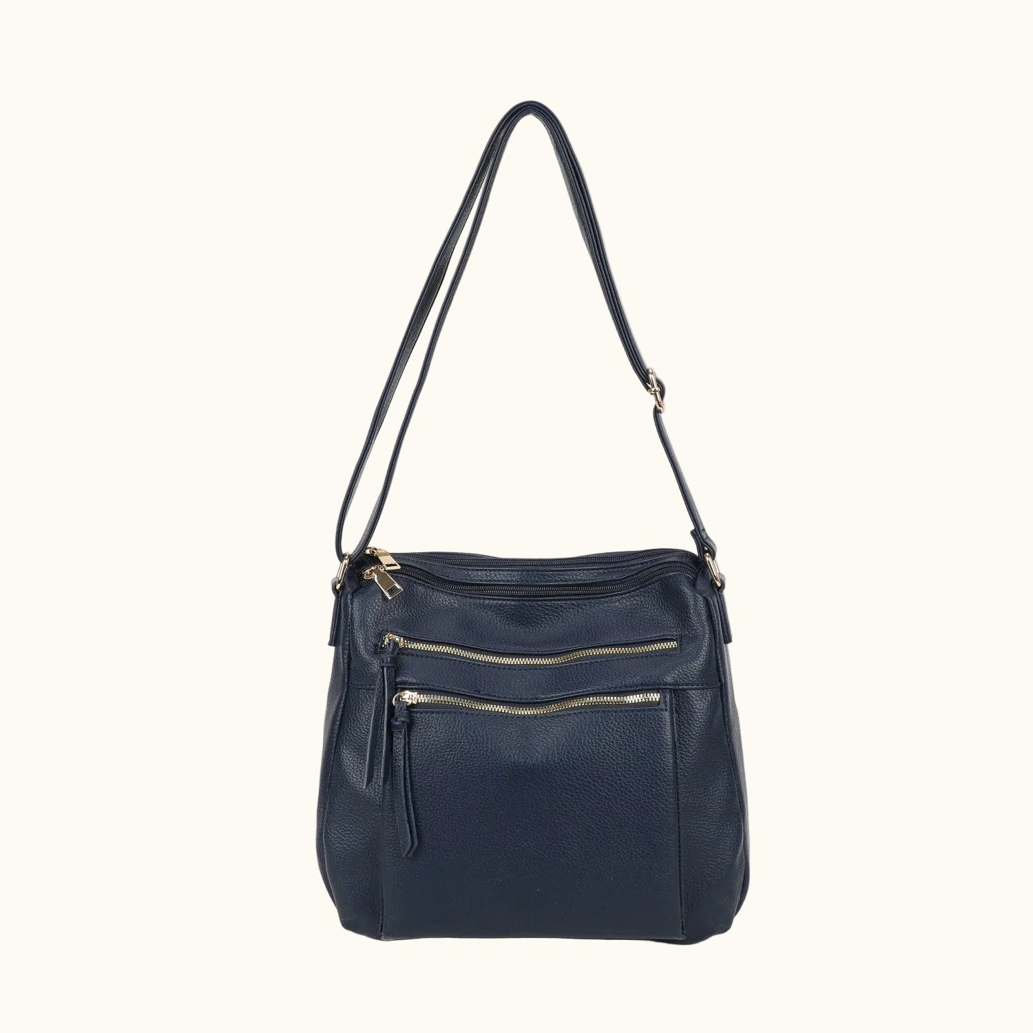 Navy blue handbag with gold zippers on a white background