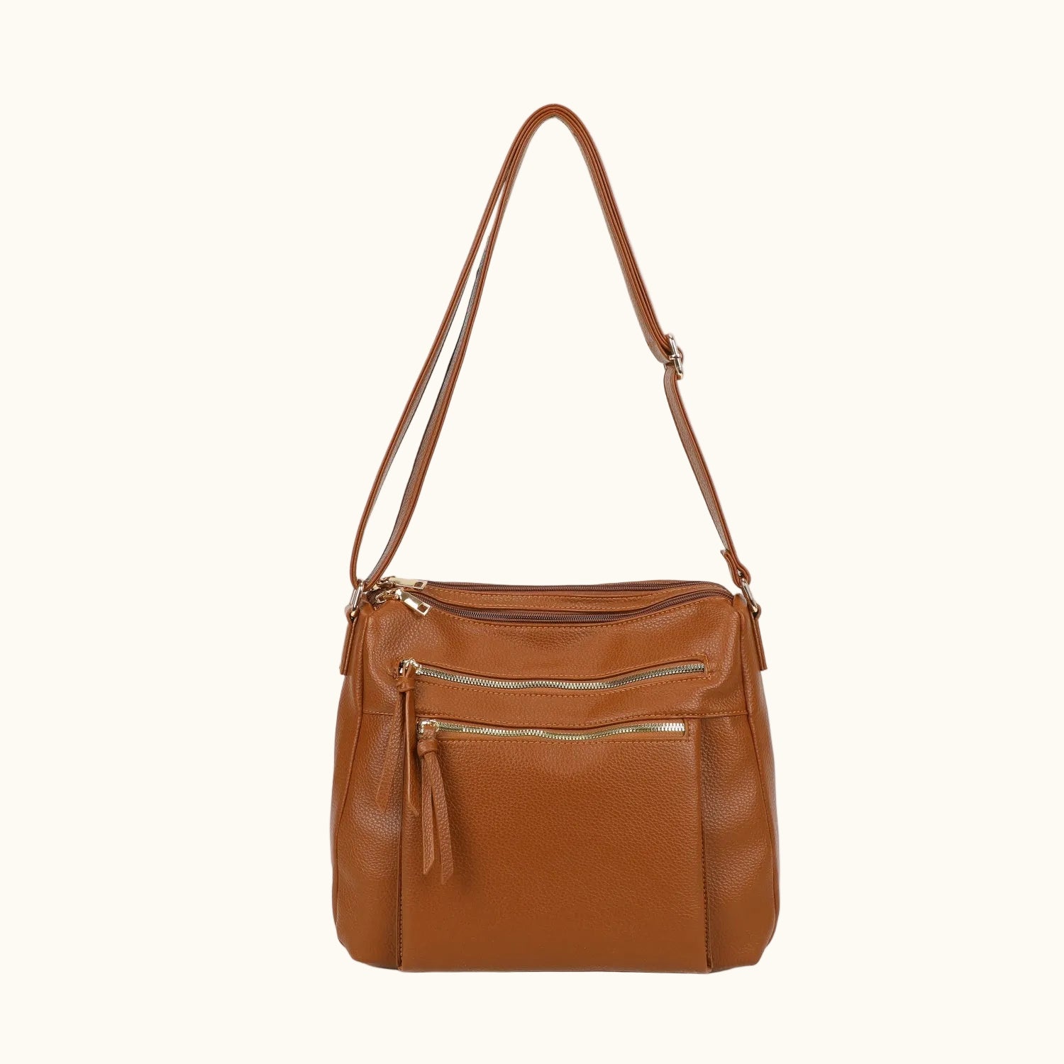 Brown leather handbag with multiple zippers on a white background