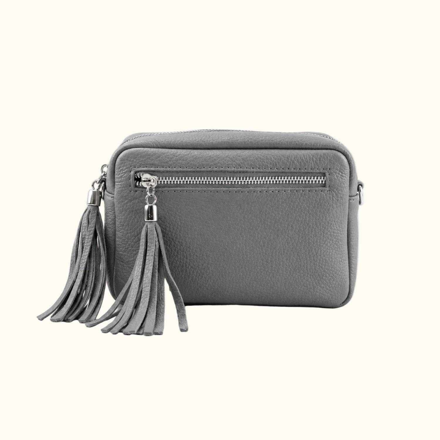 Gray handbag with tassels on a white background