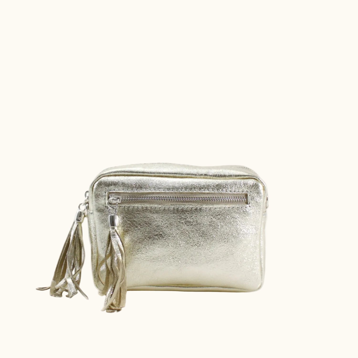 Silver metallic clutch bag with a strap on a white background
