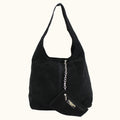 Black handbag with a chain detail on a white background