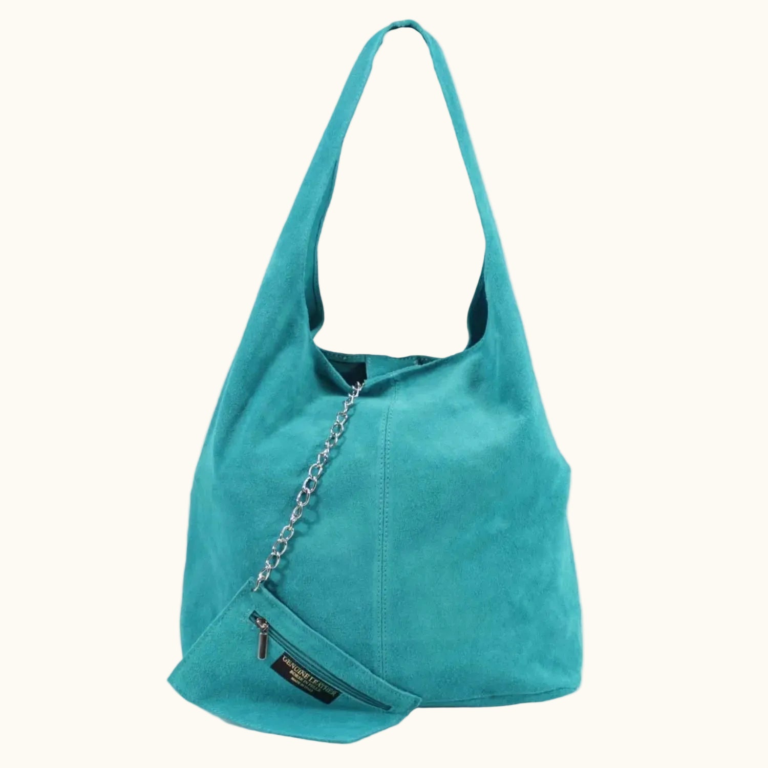 Turquoise handbag with a chain detail on a white background