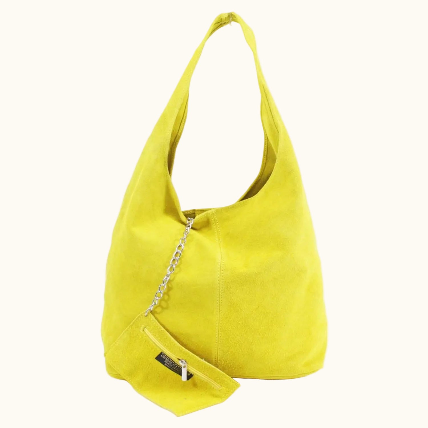 Yellow handbag with a chain detail on a white background